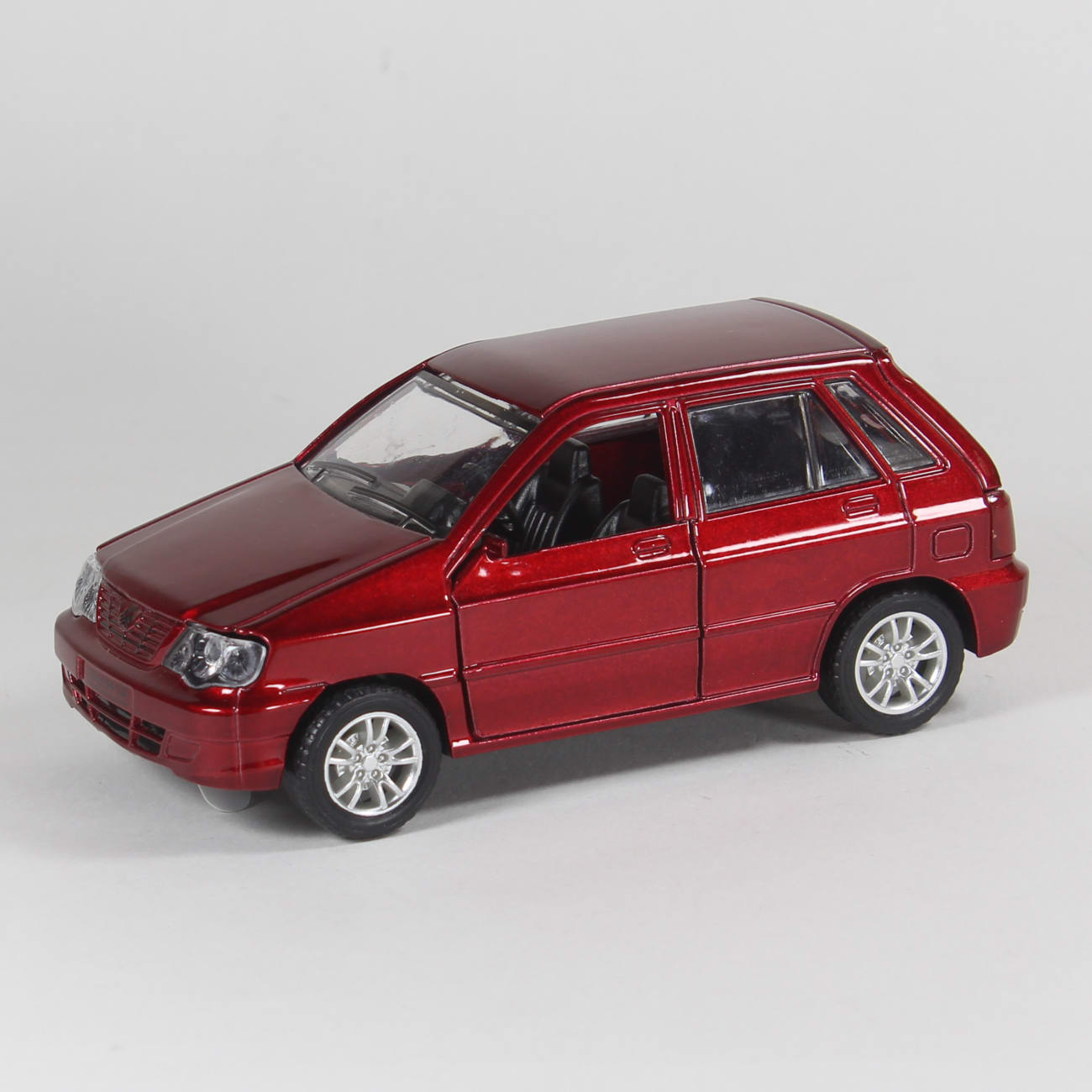 Игрушечный хэтчбек Kia Pride 1987, серебряный