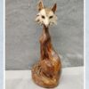 Декоративная фигурка сидящей лисы — художественная скульптура